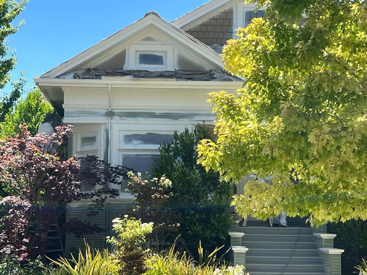White Victorian home exterior with detailed trim